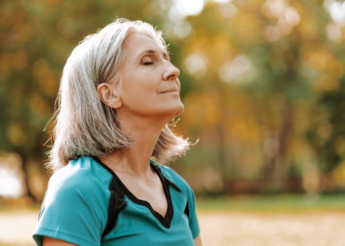 Senior,Woman,Wearing,Sportswear,Is,Enjoying,A,Sunny,Autumn,Day